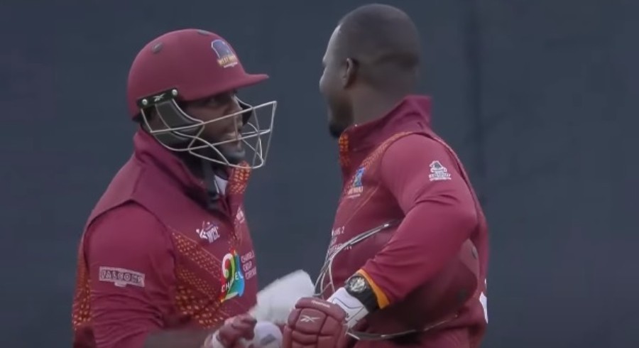 West Indies celebrated a 5-wicket win over England to become champions