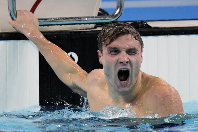 American Bobby Finke defends Olympic gold in swimming’s 1,500M, breaks world record