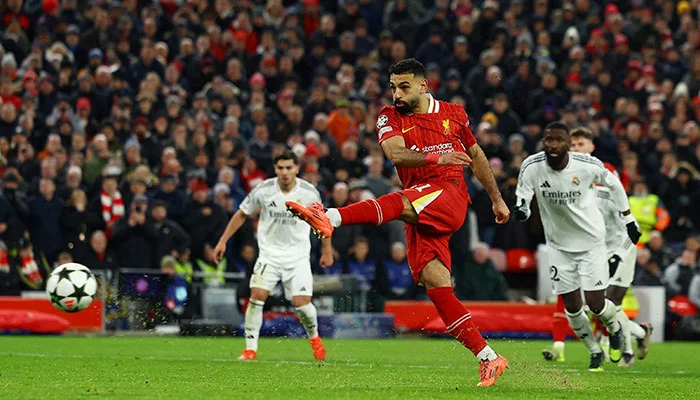 Liverpool secure historic victory over Real Madrid to top Champions League standings